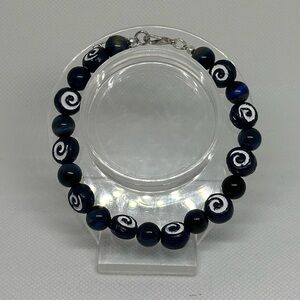 Handmade Silver Wire Bracelet with Dark Blue Tiger’s Eye and Swirl Beads